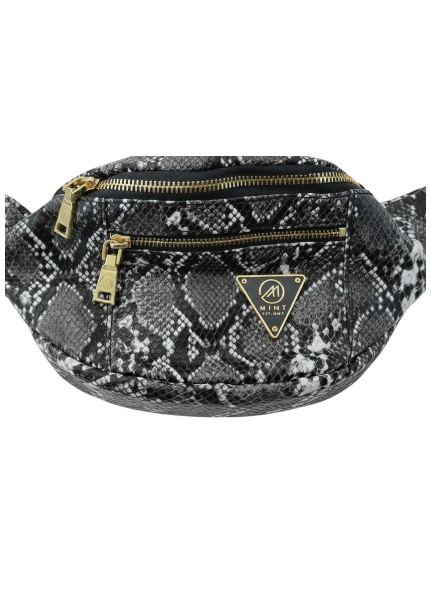 Fanny pack with snake print and gold zippers on a white background