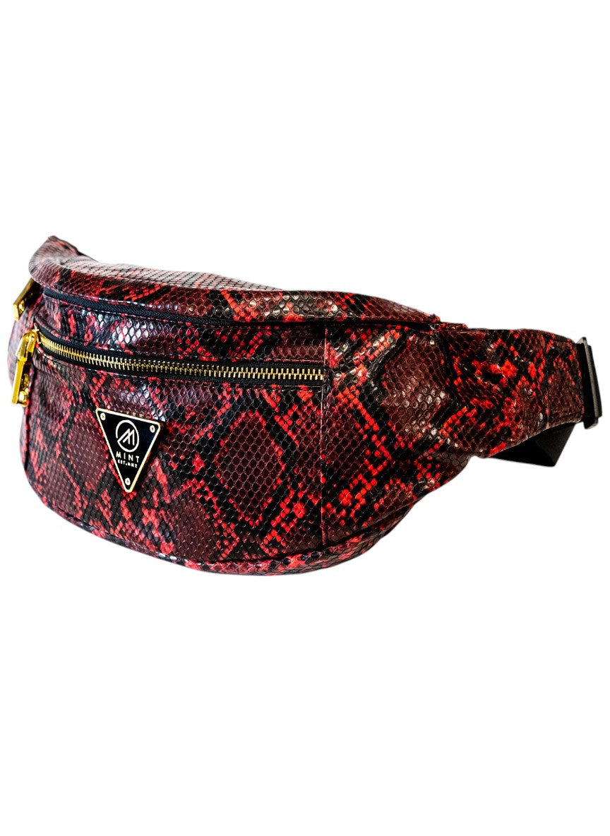 Red snake print fanny pack with a brand logo on a white background