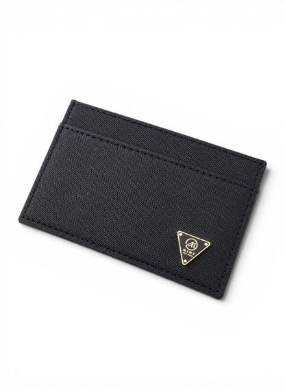Black cardholder with a gold logo on a white background By Mint Worldwide.