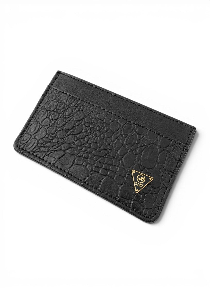 Black textured cardholder with a logo on a white background By Mint Worldwide.