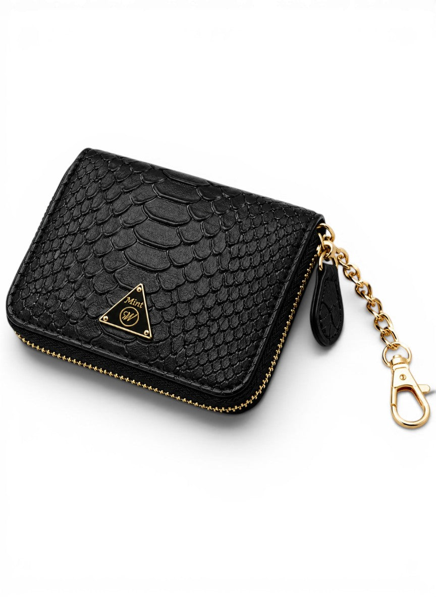 Black textured wallet with gold chain on a white background