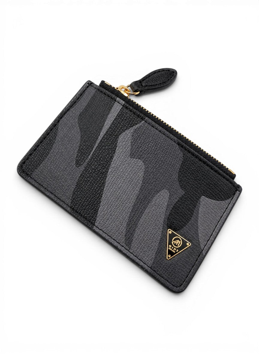 Black camouflage patterned pouch with a gold zipper on a white background by Mint Worldwide.