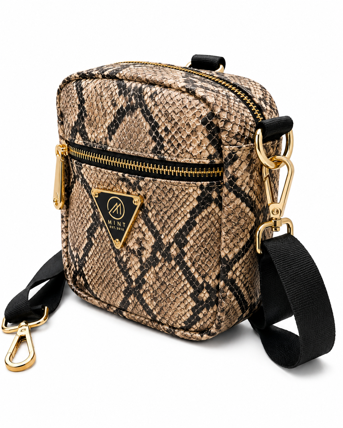 Patterned crossbody bag with gold accents on a white background