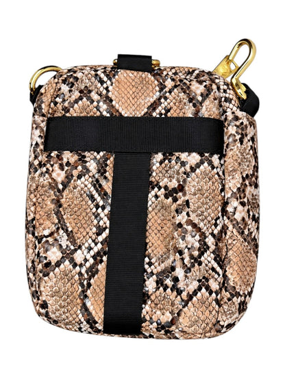 Snakeskin patterned bag with black strap on a white background